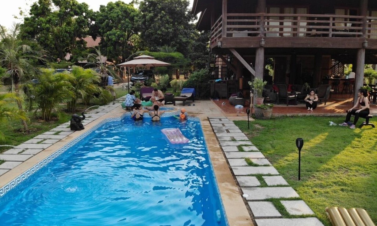 Ban Tak House | Beautiful large garden teak property right on the river in Bantak village.n