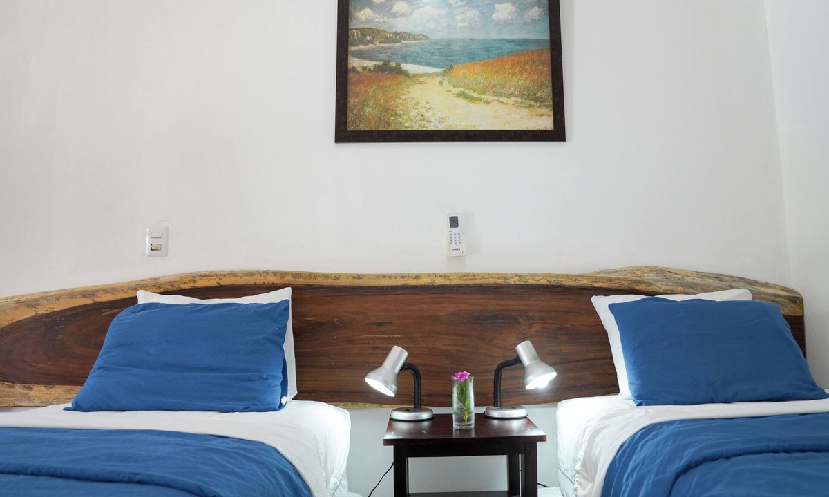 Playa Gigante Hotel | Poolside Family Room with 2 twin beds