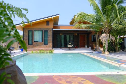 Pranburi Apartment | Stylish Resort Rooms in a Private Oasis