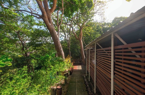 San Juan del Sur Villa | Jungle Villa with ocean view, shared infinity pool, wildlife, open-air living.
