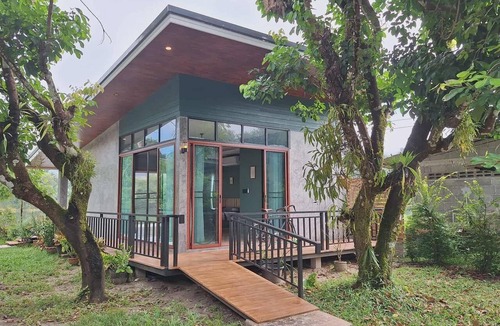 Tha Na House | Lakeview Retreat near Hin Lad Waterfall, Nature & Cycling Escape