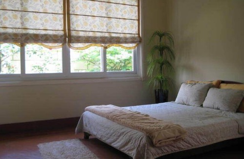 Tay Ho House | Modern Western breezy tropical villa by Red River and West Lake, Hanoi.
