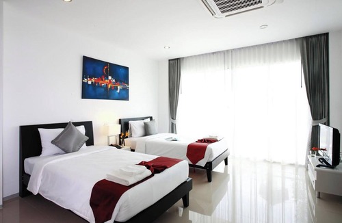 Rawai Hotel | One World One Home Naiharn Hotel