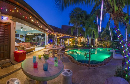 Nong Pla Lai Villa | Relaxing Palm Pool Villa, & Tropical Illuminated Garden & Private Swimming Pool.