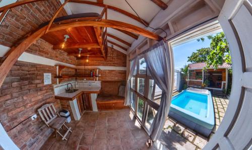 Pochomil House | Romantic Seaside Casita w Pool, AC, Fire Sunsets