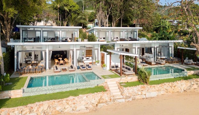 Beachfront 9BR Sunset Villas w/Staff & Saltwater Infinity Pools
