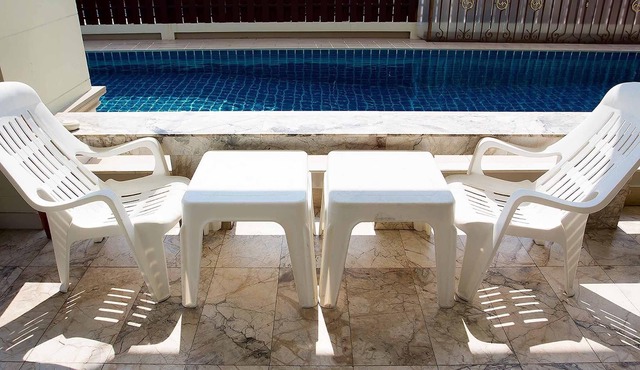 I-Rin poolvilla featuring its own swimming pool set in a private estate.