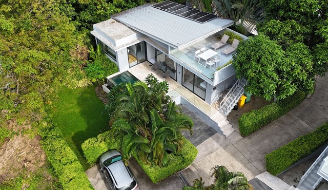 Tropical 2BR villa in Bo Phut with private pool, garden, and full kitchen—perfect island escape.