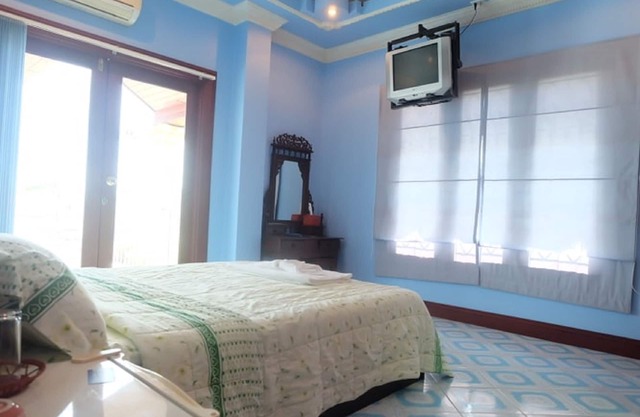Room 5, perfect for couples for a cozy getaway.