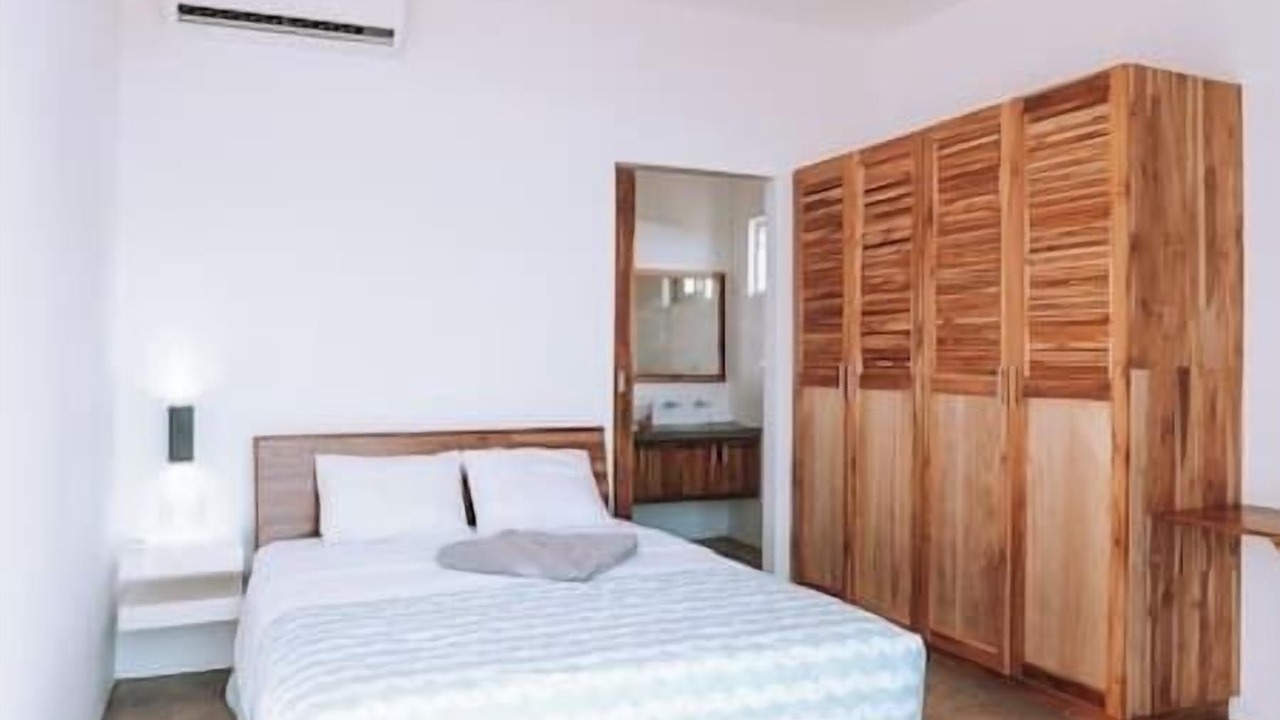 Photo of Bedroom in Paradise Bay