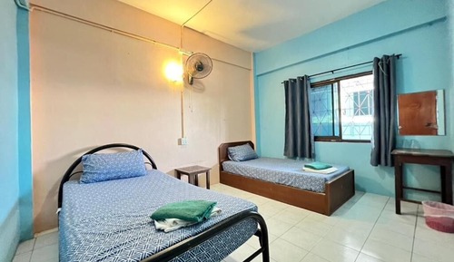 Private Twin Room with Fan Only and Shared Bathroom building C