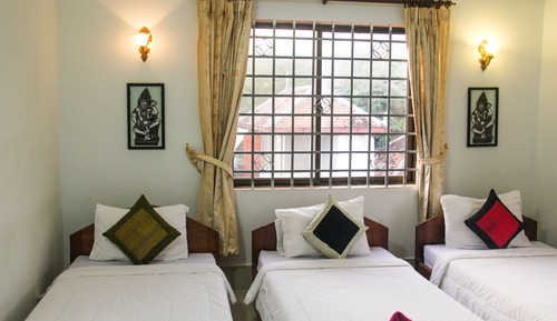 Triple Room (with A/C - Free one way airport pick up)