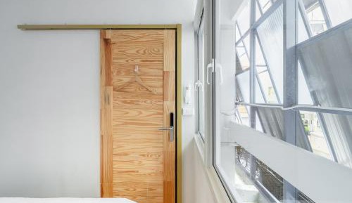 Standard room King Bed with Window Shared Bathroom