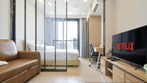 One-Bedroom Apartment with Balcony and City View