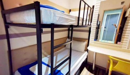 Single Bed in Male Dormitory Room