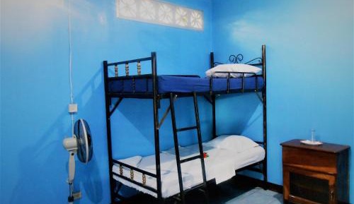 Single Bed in Dormitory Room